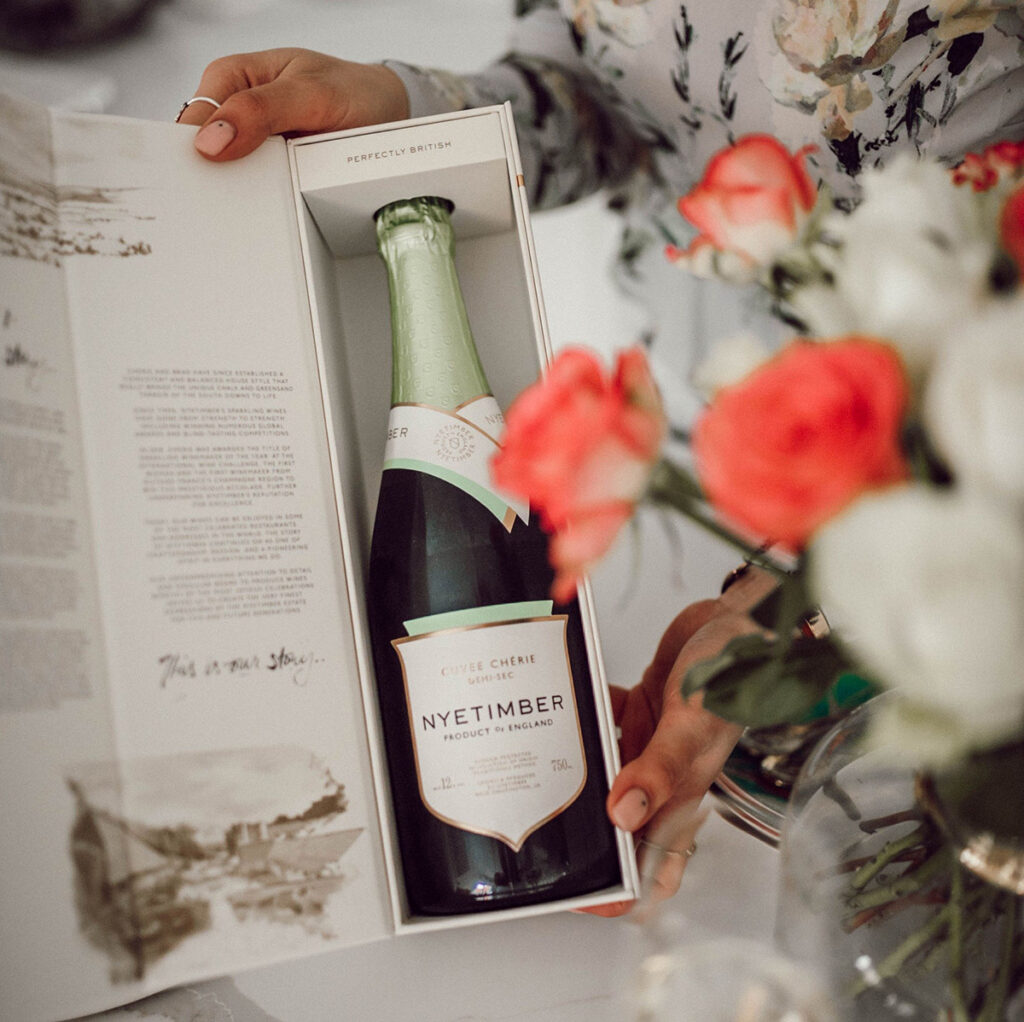 A photo of Nyetimber's sparkling wine packaging featuring illustrations by Matt Richards